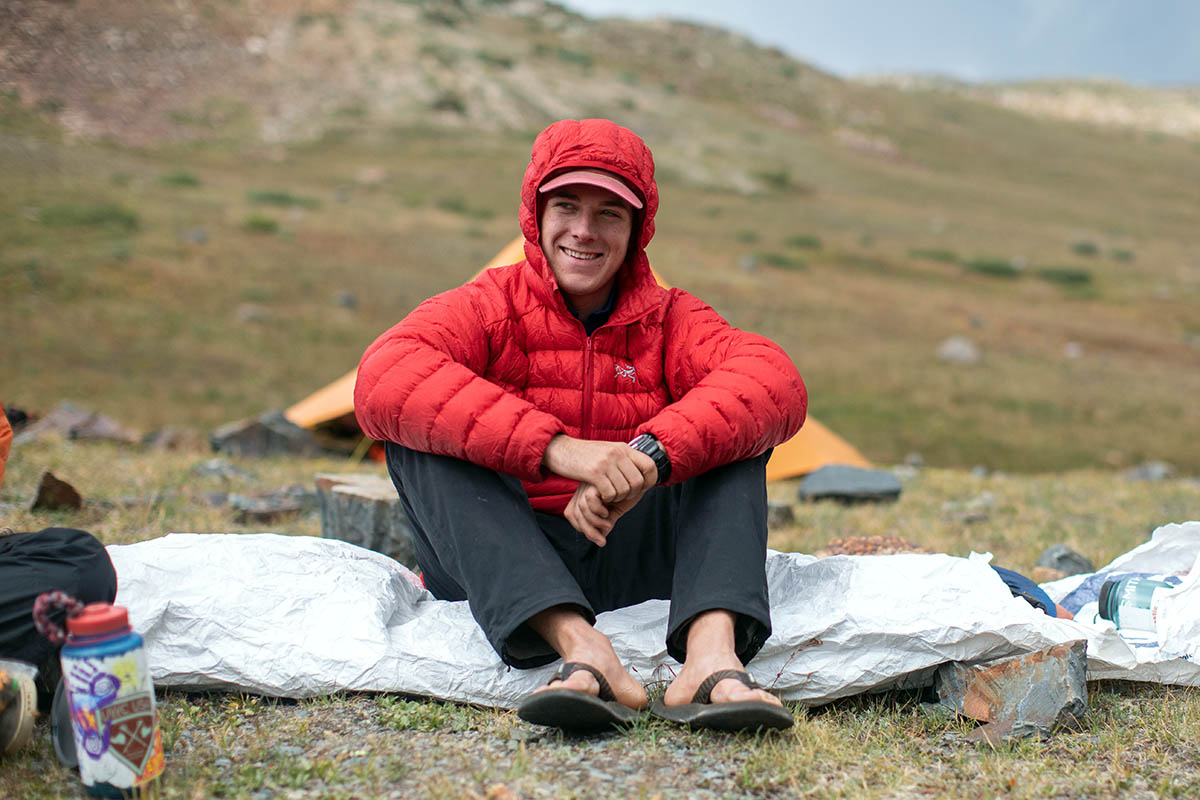 Wearing down jacket and hood in camp (Arc'teryx Cerium LT)